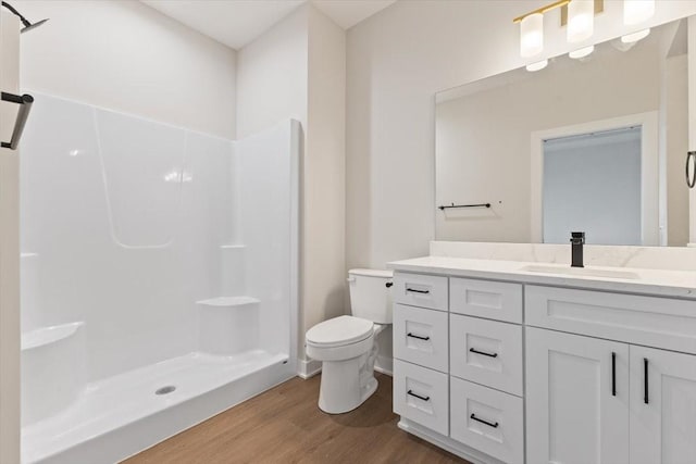 625 NW Georgetown Dr, Waukee, IA 50263 - full bath featuring wood finished floors, vanity, and a shower