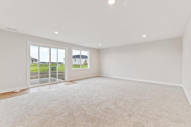 625 NW Georgetown Dr, Waukee, IA 50263 - spare room featuring recessed lighting and light colored carpet