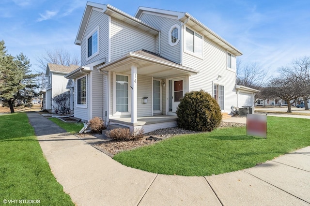 view of front of house with a front yard and a porch