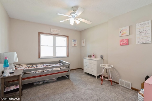 carpeted bedroom with ceiling fan