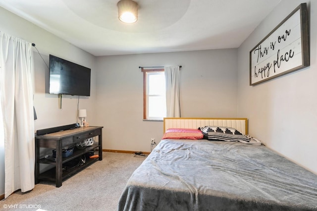 bedroom with light carpet