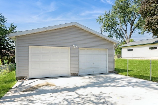 garage with a yard