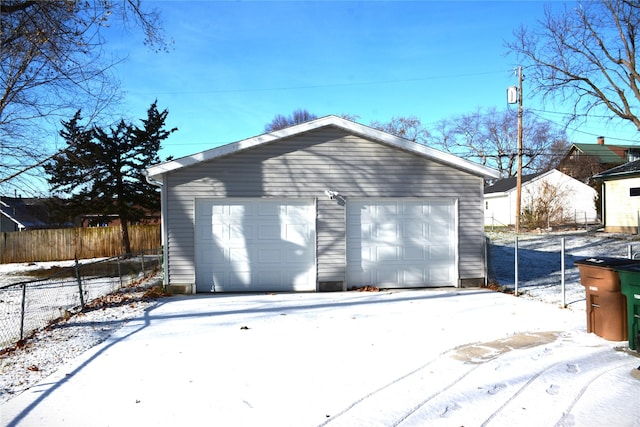 view of snow covered garage