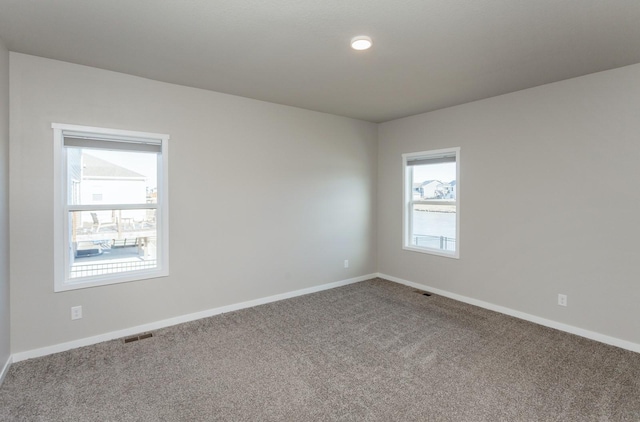 unfurnished room with carpet