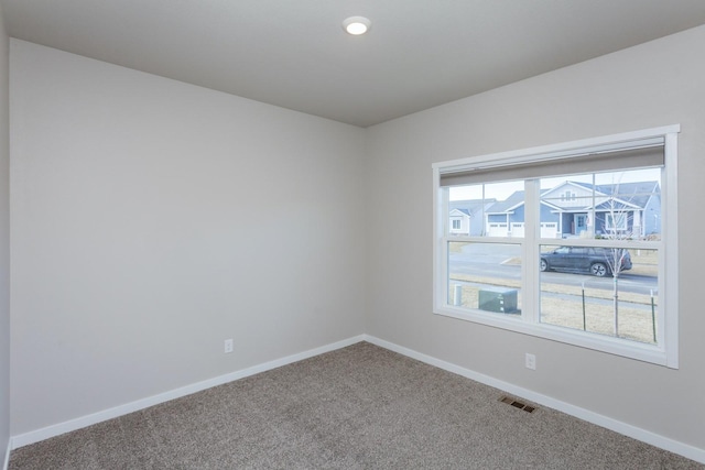 view of carpeted spare room