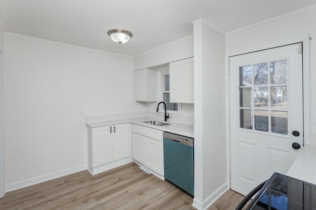 kitchen featuring white cabinetry, sink, stainless steel dishwasher, and light wood-type flooring