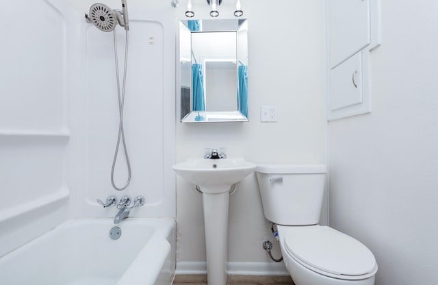 full bathroom featuring shower / bathing tub combination, sink, and toilet