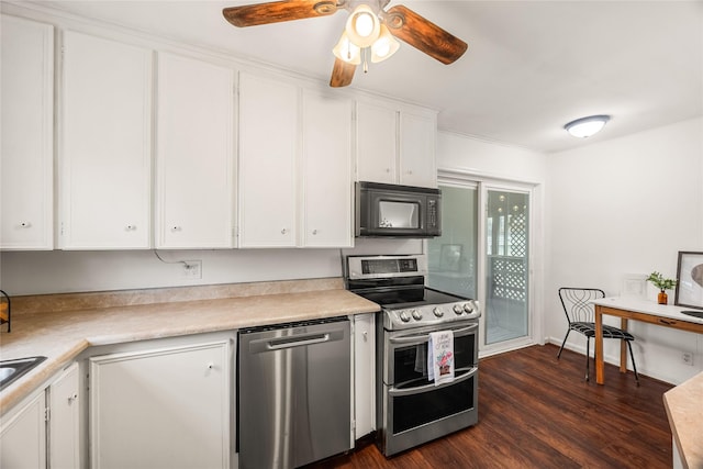 kitchen with white cabinetry, ceiling fan, stainless steel appliances, and dark hardwood / wood-style flooring