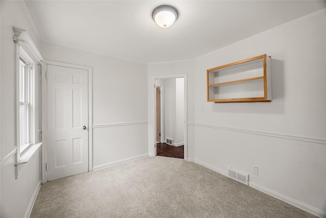 unfurnished bedroom featuring carpet flooring