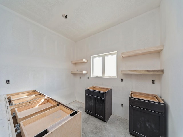 kitchen featuring a textured ceiling