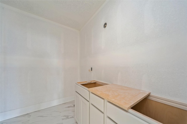 bathroom featuring a textured ceiling