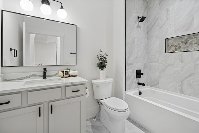 full bathroom featuring vanity, toilet, marble finish floor, baseboards, and shower / washtub combination