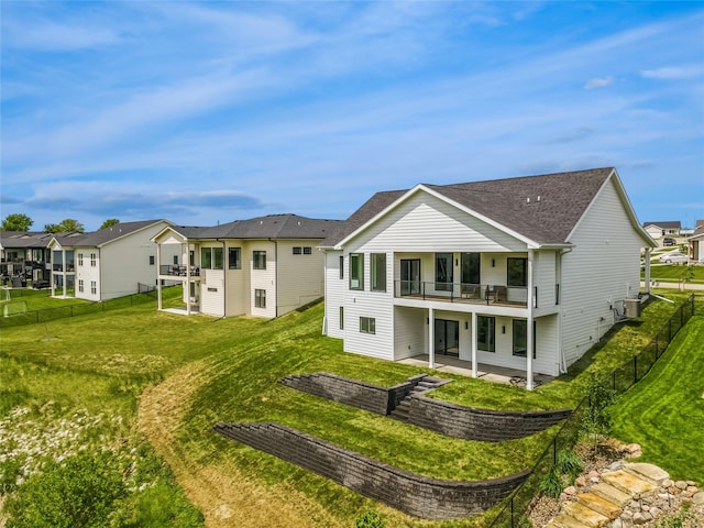 1020 Harrington Way, Waukee, IA 50263 - rear view of house featuring a patio, a balcony, and a residential view