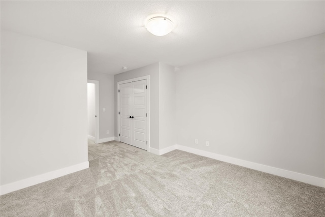 empty room with light carpet