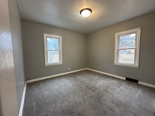 view of carpeted spare room