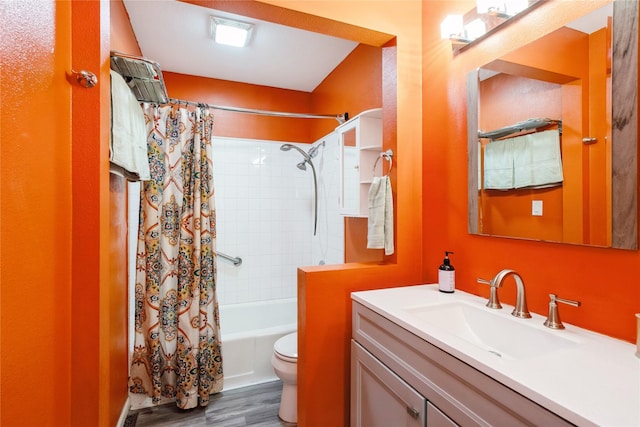 full bathroom with shower / bathtub combination with curtain, vanity, hardwood / wood-style flooring, and toilet