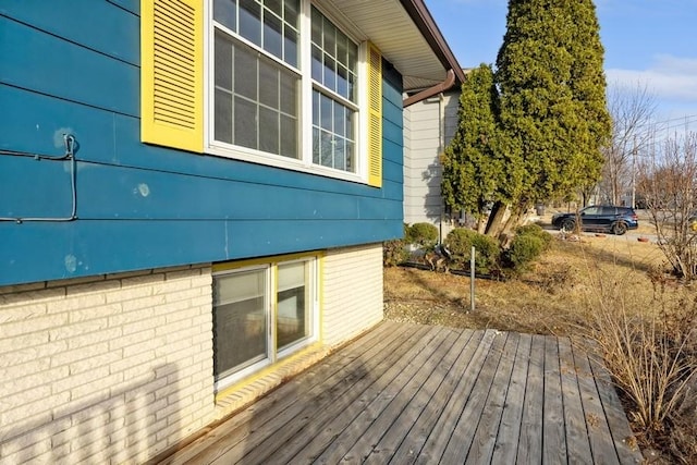 view of property exterior featuring a deck