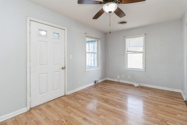 entryway featuring ceiling fan and light hardwood / wood-style floors