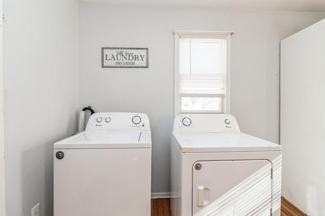 laundry room with washer and dryer