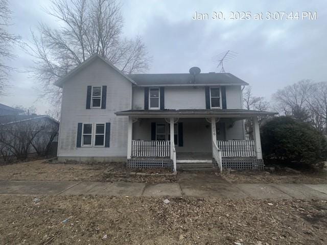 front of property featuring a porch