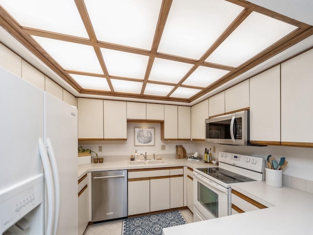 kitchen featuring stainless steel appliances and sink