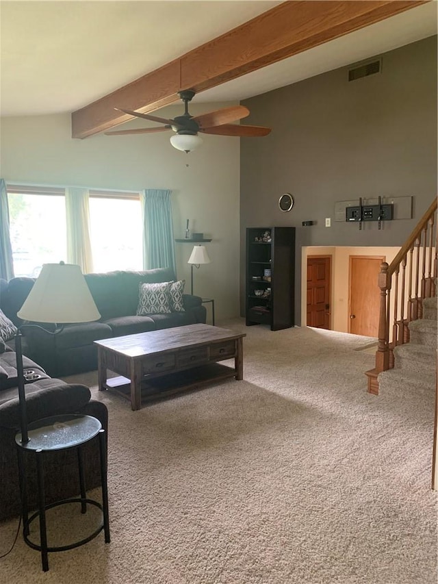 living room with ceiling fan, carpet flooring, and lofted ceiling with beams