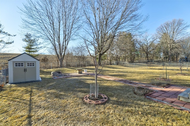 view of yard with a storage shed