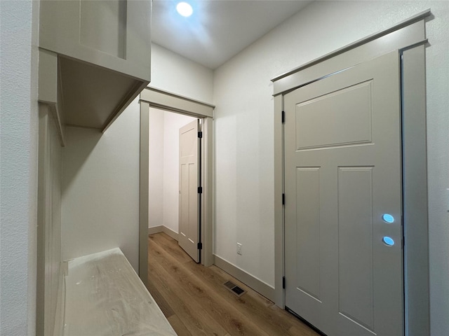 301 S Walnut Dr, Norwalk, IA 50211 - hallway featuring wood finished floors and baseboards