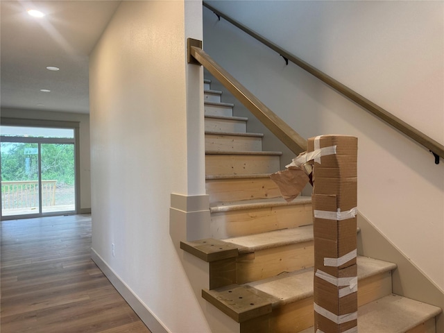 301 S Walnut Dr, Norwalk, IA 50211 - stairway with wood finished floors and recessed lighting