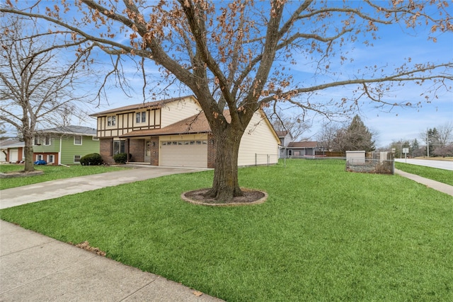 view of front of property with a garage and a front yard