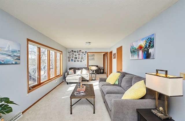 living room with light carpet and a textured ceiling