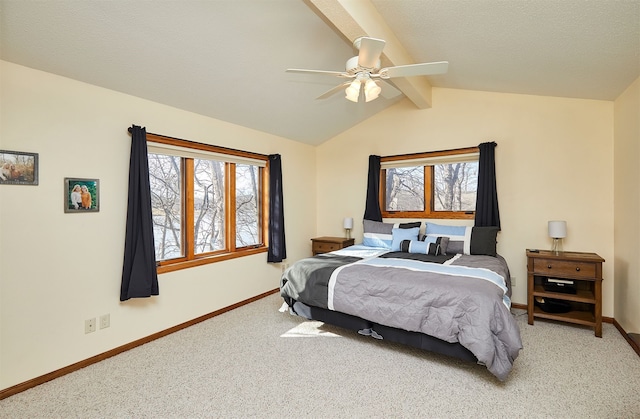 bedroom featuring ceiling fan, light carpet, and vaulted ceiling with beams