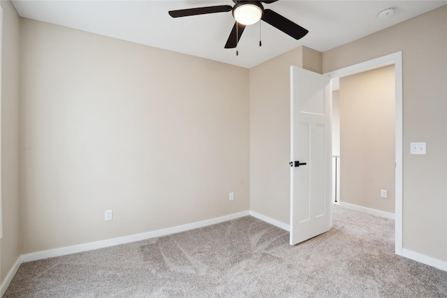 spare room with light colored carpet