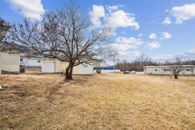 view of yard featuring central AC