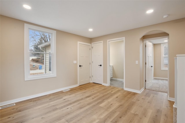 interior space featuring a healthy amount of sunlight and light wood-type flooring