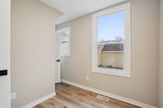 empty room featuring light hardwood / wood-style floors