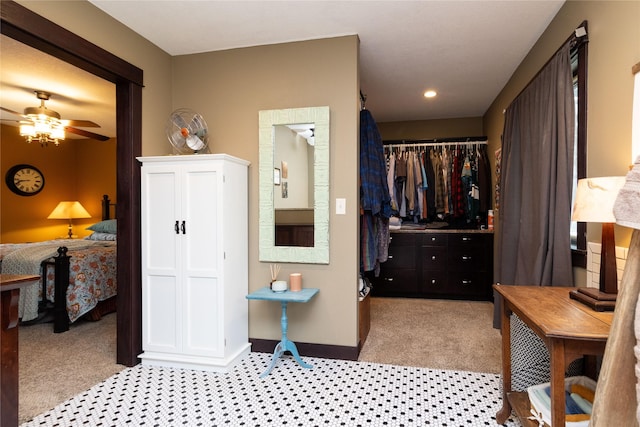 interior space featuring ceiling fan