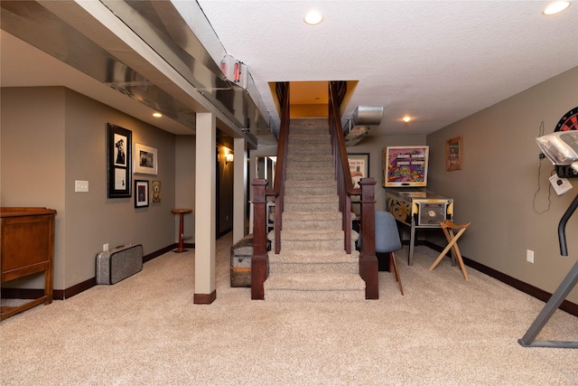 stairs featuring carpet