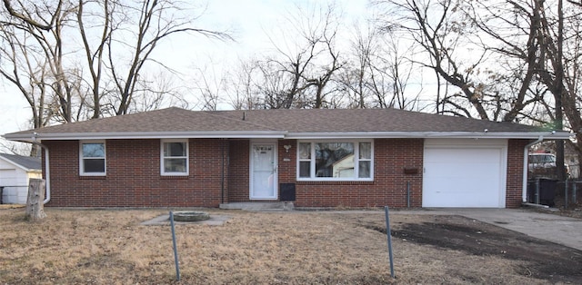 ranch-style home with a garage and a front yard