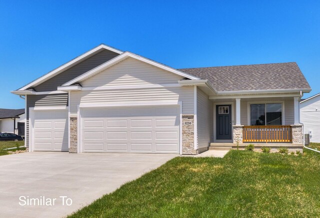 view of front of property with a shingled roof, covered porch, driveway, stone siding, and an attached garage
