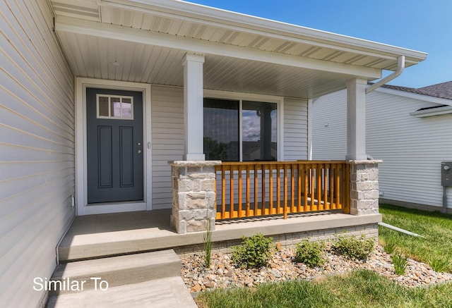 property entrance featuring a porch