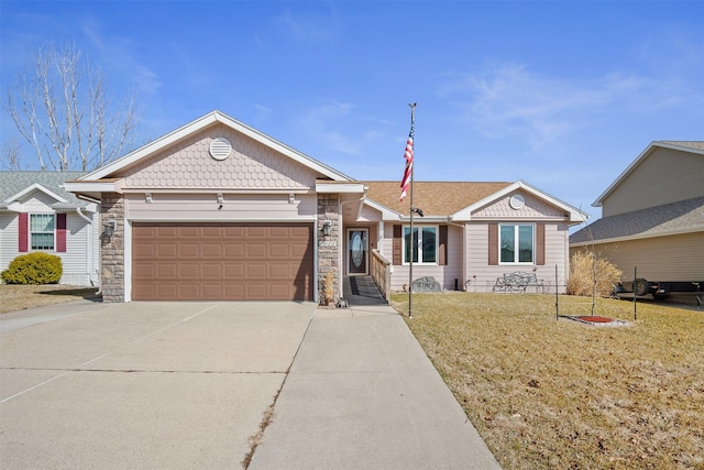 ranch-style house featuring concrete driveway, an attached garage, stone siding, and a front yard