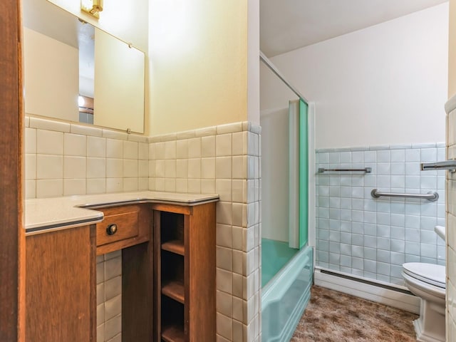 full bathroom featuring shower / tub combination, tile walls, vanity, baseboard heating, and toilet