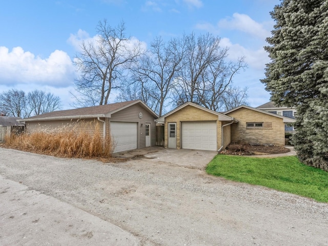 view of side of property featuring a garage