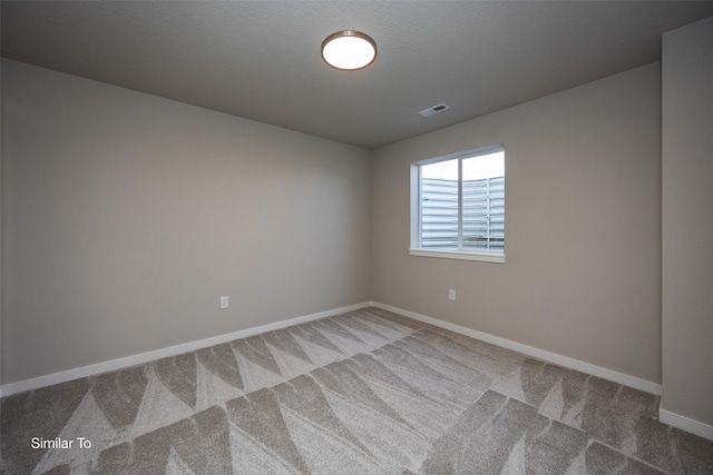 6443 NE 11th Ct, Des Moines, IA 50313 - empty room with carpet flooring and baseboards