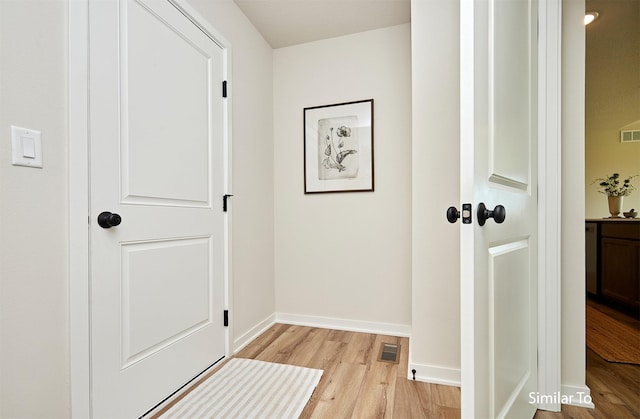 doorway to outside featuring light hardwood / wood-style floors