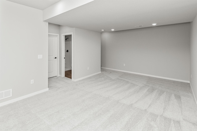 6423 NE 11th Ct, Des Moines, IA 50313 - unfurnished room featuring carpet flooring, baseboards, and recessed lighting