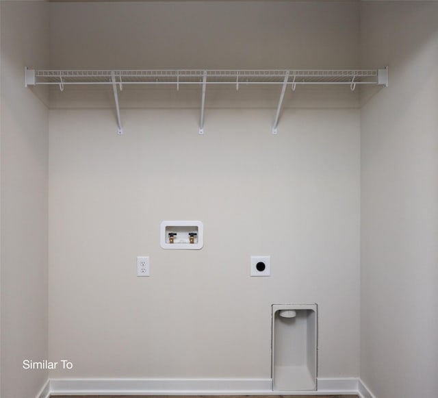 washroom featuring laundry area, hookup for a washing machine, electric dryer hookup, and baseboards