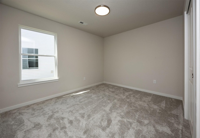 2228 Legacy Dr, Norwalk, IA 50211 - carpeted spare room with baseboards
