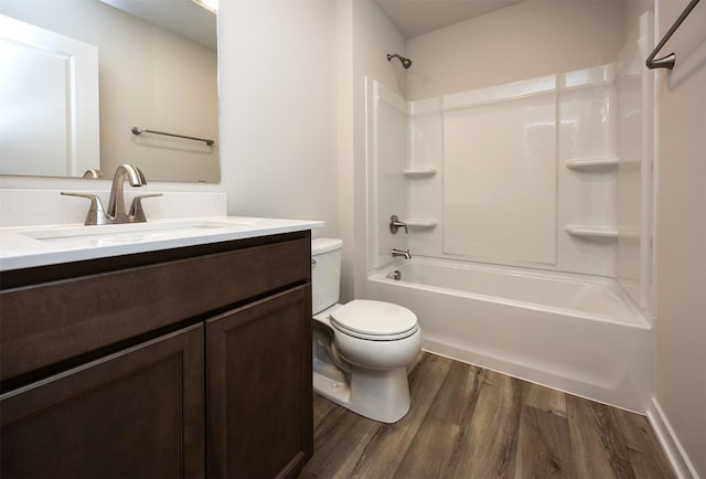 2228 Legacy Dr, Norwalk, IA 50211 - full bathroom with wood finished floors, toilet, vanity, and tub / shower combination